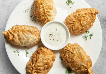 Манты жареные с мясом и тыквой